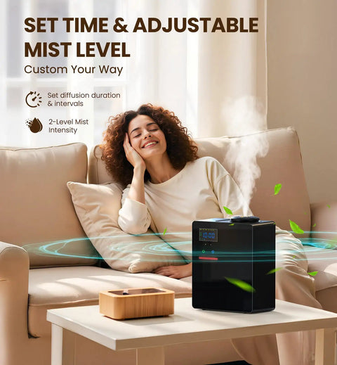 Chill Out Your Space With This Waterless Essential Oil Diffuser Featuring Smooth Bluetooth App Controls And Epic Five Thousand Square Foot Range For Massive Living Rooms Or Busy Offices So Lowkey Silent Cold Vapor Tech Holds Bold Scents Crisp And Dry in a cozy living room with adjustable mist.