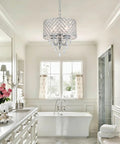 Bathroom with modern crystal pendant light with drum shade in chrome 4 light chandelier, featuring glass crystal drops for a lux minimal look.