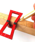 Top Shelf Aluminum Dovetail Marker Tool For Heavy Duty Woodworking Crafts And Shop Projects Slick Precision Guide with red grip marking wood.