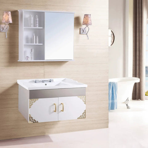 Bathroom vanity with mirror, shelves, and sink; gold cabinet pulls on a modern white cabinet below