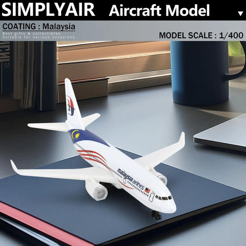 Malaysia 1/400 Scale Airplane Model Kit, alloy body with plastic base, displayed on notebook, no assembly required.