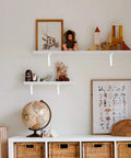 Room with shelves supported by Ten Pack Heavy Duty Shelf Triangle Brackets 12 Inch Long By 8 Inch High Right Angle L Braces.