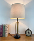 Retro Metal Bedside Lamps Set Of 2 With Touch Control and 3 Way Dimming, USB Charging Ports, Beige Linen Shade on wooden table