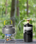 Windproof 3500W Camp Stove Portable Gas Stove with Piezo Ignition and Fuel Canister on outdoor table