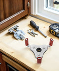 Heavy Duty Aluminum Smoke Transducer Removal Head Tool Rock Solid Sensor Socket Extractor on workbench with tools.