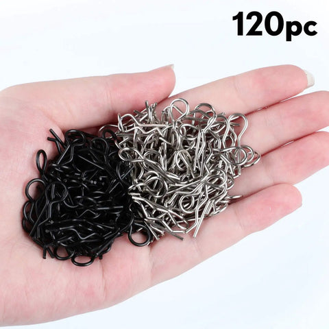 Hand holding Premium Universal Rc Body Clips 120 Pieces Stainless Steel Rc Clips Set Silver and Black for 1/10 to 1/12 Scale Cars