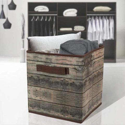 Foldable Storage Cube Baskets 4 Pack In Rustic Brown Wood Grain Finish for Closet Organization with pillows and blankets inside