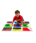Child playing on Liquid Sensory Floor Tiles 15.8 Inch Square 4 Pack Colorful Fun Non-Toxic Liquid Moves With Every Step Anti Slip Backing