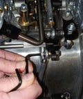 Person uses Pro Grade Industrial Long Arm Hex Key Allen Wrench 1 Inch American Made Alloy Steel on machinery.