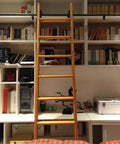 Rock Solid Ladder Sliding Hardware Kit With 20 Foot Barn Door Rail And Floor Casters For Quick Garage Or Closet Upgrade Smooth Glide Action and reliable snap together track on a wooden ladder.