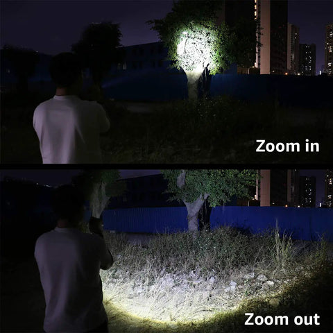Person using Rechargeable LED Flashlight With Zoomable Beam, 1000 Lumens Beast Bright to illuminate tree and ground at night.