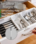 Open kitchen drawer with silverware and utensils, showcasing 4 Pack No Drill Magnetic Cabinet Latches, Adhesive Stainless Steel Door Catch, Neodymium Magnet Child Safety Locks For Kitchen Cabinets, Drawers, RVs, And Closets installed on inside.