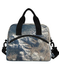 Front view of durable insulated lunch bag tote with adjustable shoulder strap, featuring desert mountain inspired style.