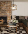 Cozy living room with brick fireplace and Gold Small Hanging Glass Pendant Light With 16ft Plug In Cord Dimmable And Adjustable Mini Pendant