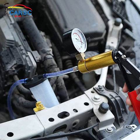 Hand Held Vacuum Pump Tester Kit With Vacuum Gauge And Brake Bleeder For Automotive Use Do It All Tool Set With Adapters And Case Cushioned Grip For Easy Pressure Testing And Bleeding Brakes connected to engine bay hose