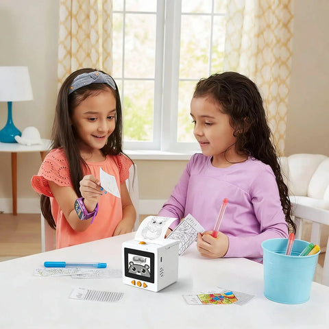 Two girls using the Sweet Smart AI Voice Activated Sticker Printer Portable Inkless Thermal Craft Device with Touchscreen Panel.