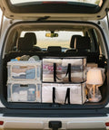 Car trunk with 8 Pack Extra Large Heavy Duty Moving Bags Waterproof Storage Totes With Handles And Zippers Foldable, stacked neatly.