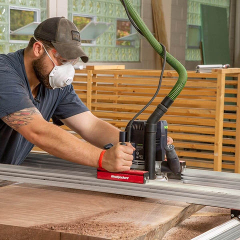 Man using Basic Slab Flattening Mill For Wood Slabs 38.75 By 56.5 Inches USA Made Leveling Jig With Router Sled in workshop