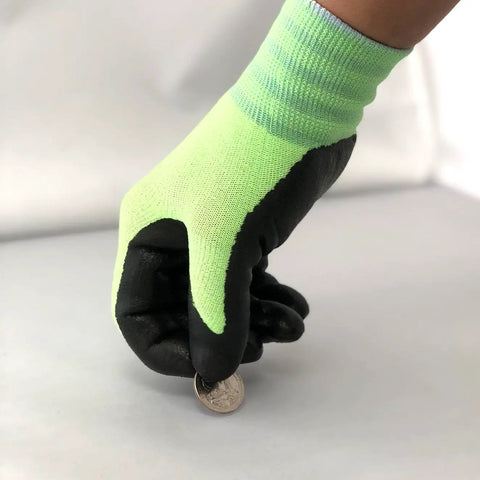 All Day Comfort Nitrile Foam Coated Work Gloves with Rock Solid Grip Large 10 Pairs, holding a coin, green-black design
