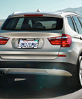 Rear view of SUV with Patriotic Black American Flag License Plate Frames 2 Pack Front And Rear Aluminum Car Tag Holder