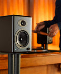 Powered Bookshelf Speakers For Turntables, Vinyl Setup And Streaming - 150W Of Room-Filling Crisp Kickin' HiFi Audio, satin black speaker close-up.