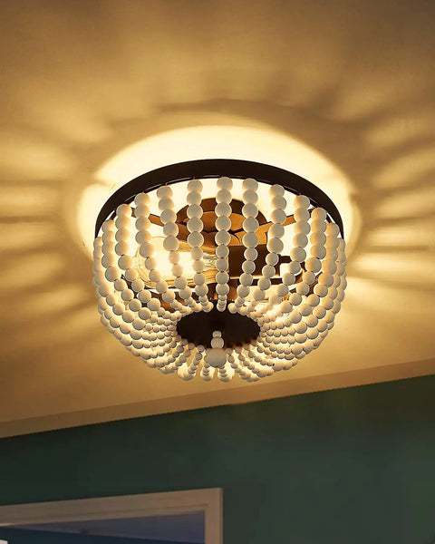Boho Flush Mount Light Fixture With Two Lights Natural White Wood Beaded Ceiling Light illuminating a room with warm glow.
