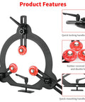 Woodturning steady rest for lathe with black metal frame and three red rubber wheels.