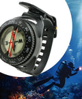 Waterproof Luminous Compass For Hiking And Camping With Precise Navigation And All Weather Durability against diving backdrop