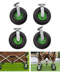 10 Inch Pneumatic Caster Wheels Set Of 4 Featuring Two Swivel And Two Rigid Black Rubber Tires on a garden cart with green accents.