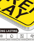 Close-up of Slow Down Children At Play Safety Signs 2 Pack 17 By 13 Inch Double Sided Corrugated Plastic with durability icons