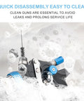 Heavy Duty Hvlp Gravity Feed Spray Gun With Triple Adjust Dials And Air Gauge Running Slick For Car Paint Primer And Top Coat submerged in soapy water for cleaning.