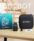 Self Leveling Pro Grade 360 Green Laser Level With 4000mAh Battery on table with box, carrying case, and magnetic mount