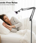 Floor Magnetic Phone Holder For Bedside Use, adjustable bed mount showcased next to a woman relaxing in bed.