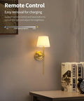 Legit Dope Gold Cordless Wall Sconces Set Of Two With Soft Beige Fabric and warm LED lighting featuring remote control for brightness.