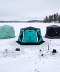 Large Hexagonal Ice Fishing Tent With Chimney Vent For Hot Tent Camping Quick Snap Setup Insulated Winter Shelter Peacock Green setup on ice.