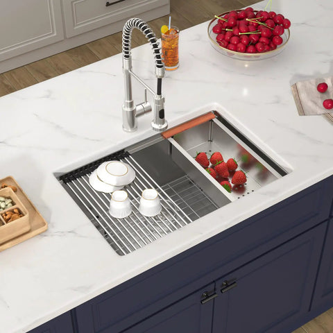 Undermount 14X19 Inch Bar Sink In 16 Gauge Stainless Steel, with dishes and fruit, installed in a white countertop kitchen.
