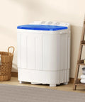 Game Changer Compact Twin Tub Portable Washing Machine With Fast Spin Dryer And Simple Dial Controls Lightweight in a room setting.