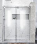 Stylish bathroom with marble walls and walk-in shower featuring glass doors, showing a modern and clean design.