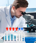 Scientist using microscope next to clear plastic test tube rack for lab and classroom use holds multiple tubes with color caps.