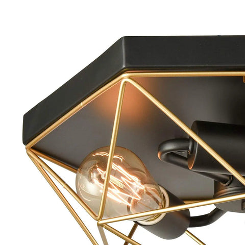 Close-up of Brass Industrial Flush Mount Ceiling Light 3 Light Square Cage Fixture in Black and Gold, showing bulb and cage design.