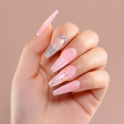 Hand showcasing pink nail extensions using HEMA Free Builder Gel Kit With 6 Colors 15ml Each For Nail Extensions, glitter accents visible