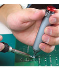 Pro Grade Solder Suction Tool With Silicone Nozzle One Handed Operation Heat Resistant Up To 350C in use on circuit board