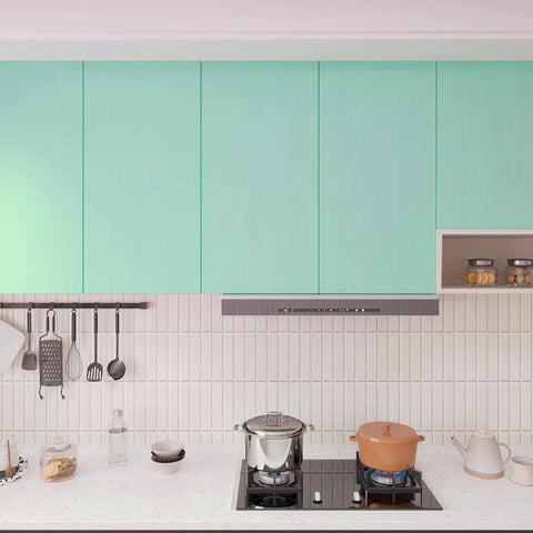 Thick Pastel Mint Metallic Peel And Stick Wallpaper With Brushed Matte Surface Gives Your Space A Straight Up Glow Up self-adhesive backsplash in modern kitchen.