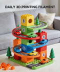 Colorful toy car track set made from Daily 3D Printing Filament with cars and trees on a table near a gray sofa.