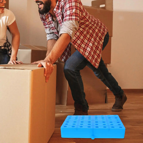 Ventilated Plastic Floor Riser Pallet with Raised Design and Forklift Friendly Structure for Warehouse Use, in front of boxes