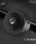 Tiny WiFi Spy Camera With Night Vision, Ultra Small Hidden Nanny Cam For Home And Office shown next to a phone, 43mm diameter.