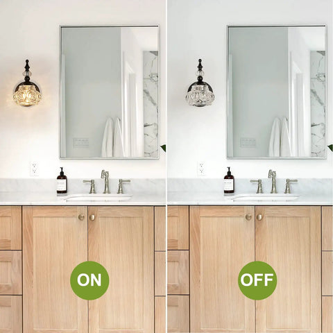 Two Pack Black Wall Sconces With Glass Shade Dope Vanity Bath Lighting in bathroom, one lit on left, mirrored view.