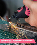 Rock Solid Corded Rotary Tool Kit With 180 Watt Motor Variable 8000 To 35000 Rpm in action grinding metal with sparks flying.