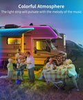 Family enjoying picnic near RV with 100ft RGB Outdoor LED Strip Lights With App Control Bluetooth Music Sync IP65 Waterproof.
