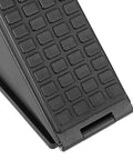Close-up of matte black heavy duty door stopper with spring design, showing textured grip surface and adjustable metal frame.